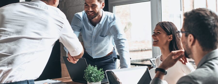 Two businessmen shaking hands during a meeting