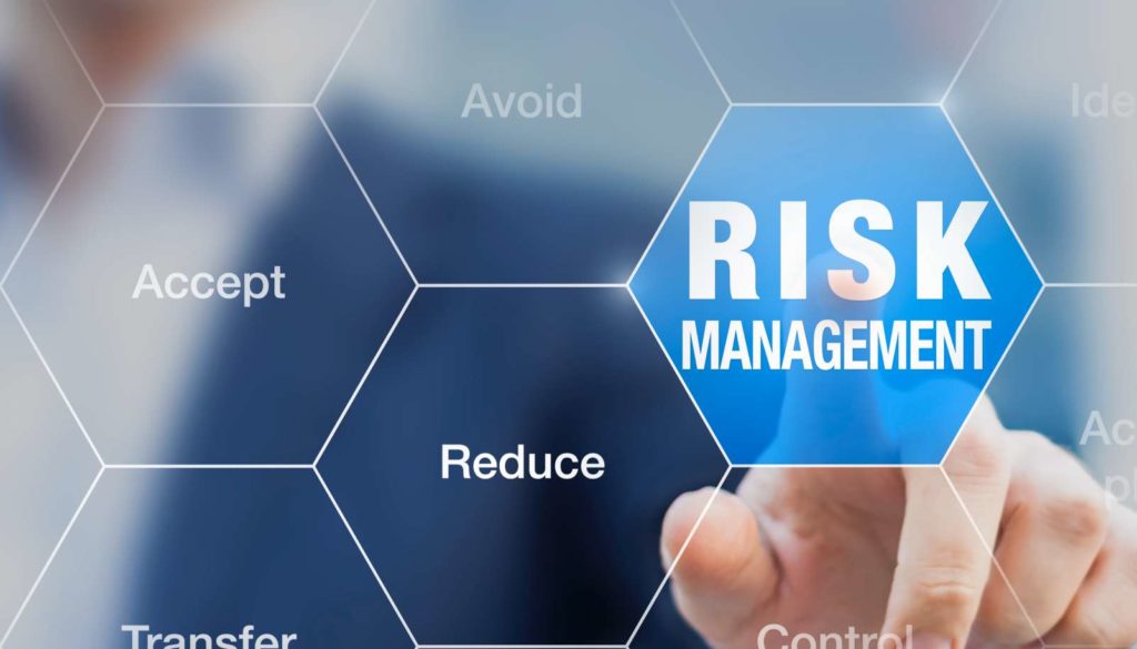 finger pushing on risk management