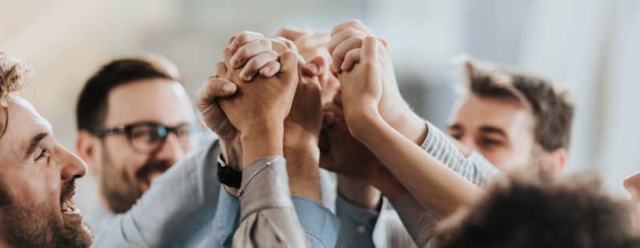 people holding hands in air